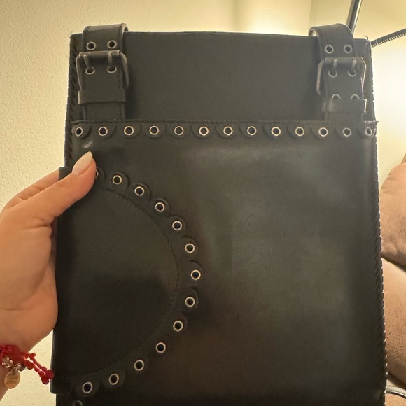 Authentic Yves Saint Laurent  Leather Grommet Detail Shoulder Handbag Black. - Picture 13 of 14